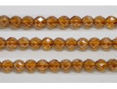 60 perles verre facettes topaze fonce lustre 5mm